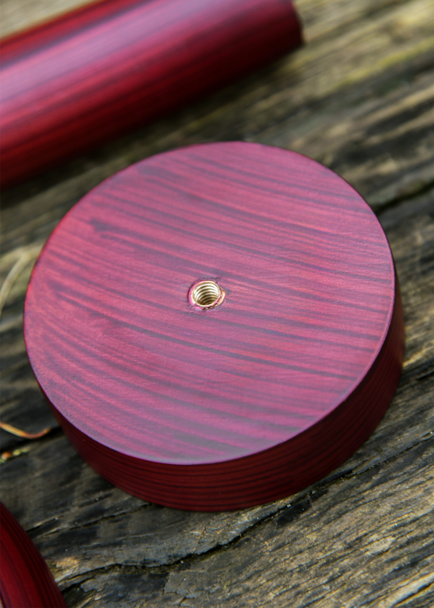 Wooden helmet stand with round base