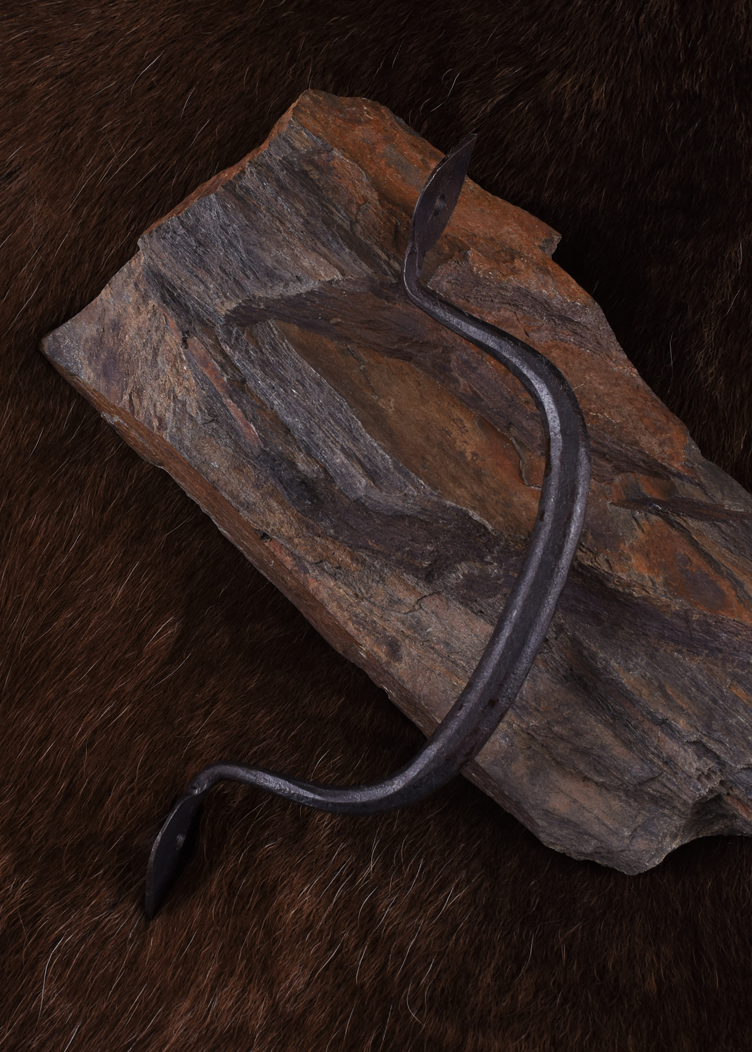 Hand-forged handle fitting
