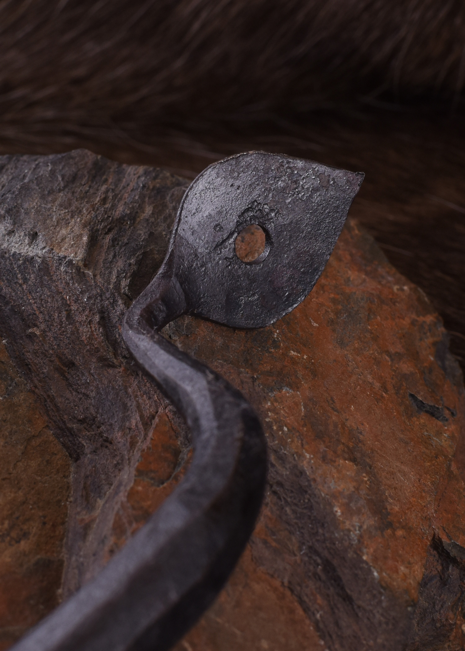 Hand-forged handle fitting