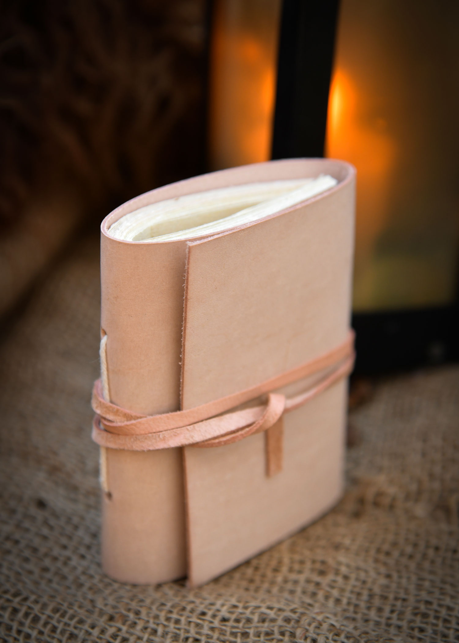 Small pocketbook, plain natural leather, 7 cm x 11 cm