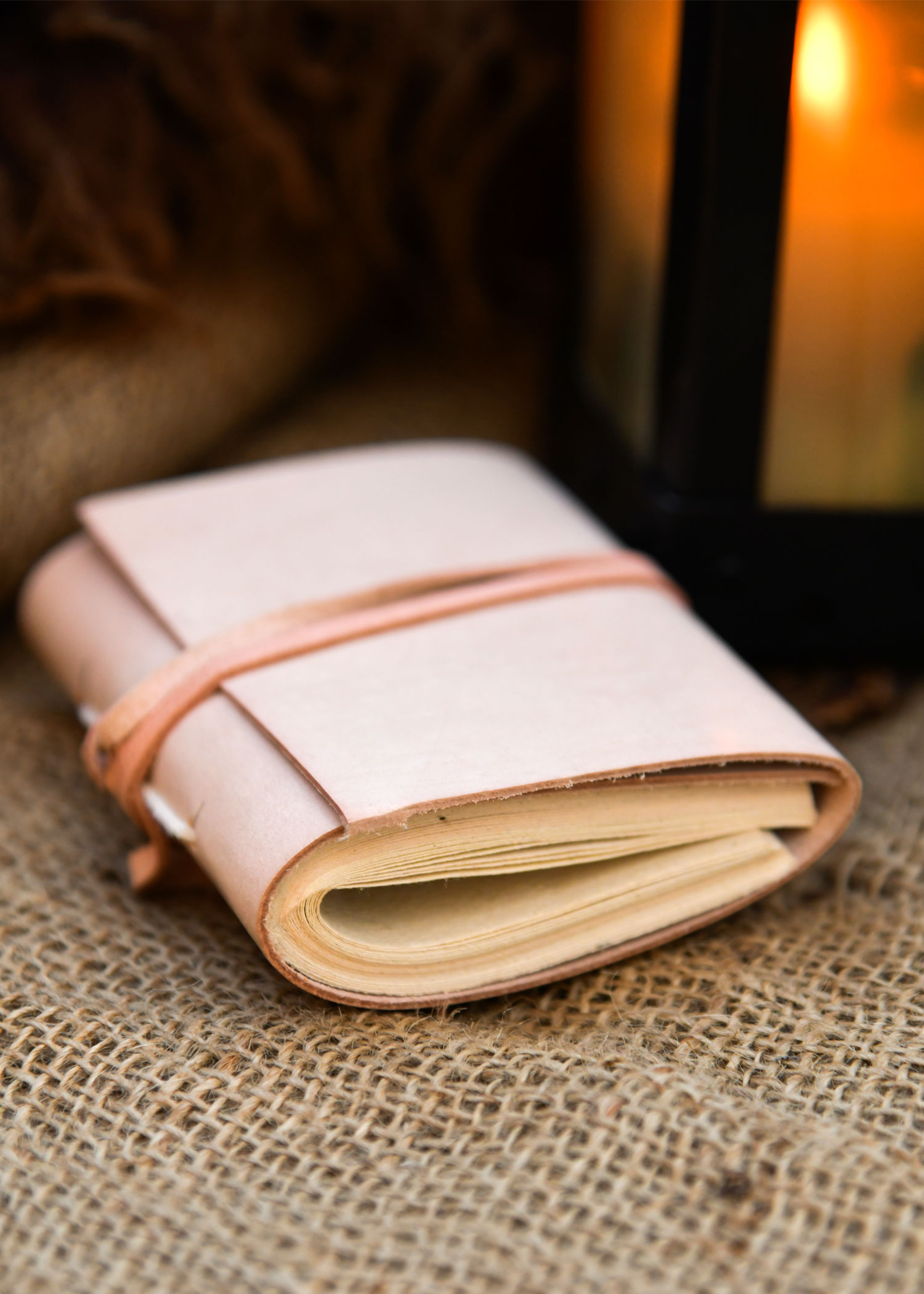 Small pocketbook, plain natural leather, 7 cm x 11 cm