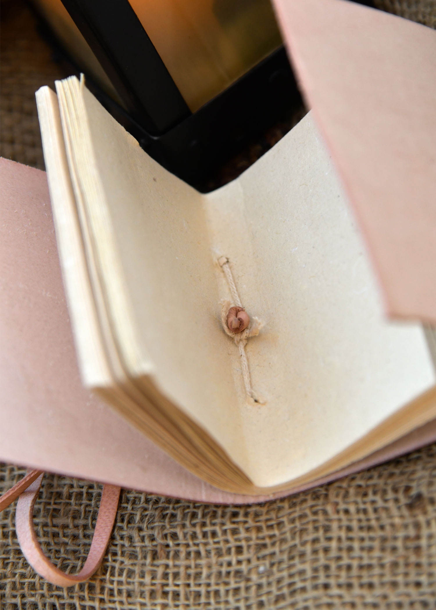 Small pocketbook, plain natural leather, 7 cm x 11 cm
